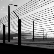 fence with barbed wirea